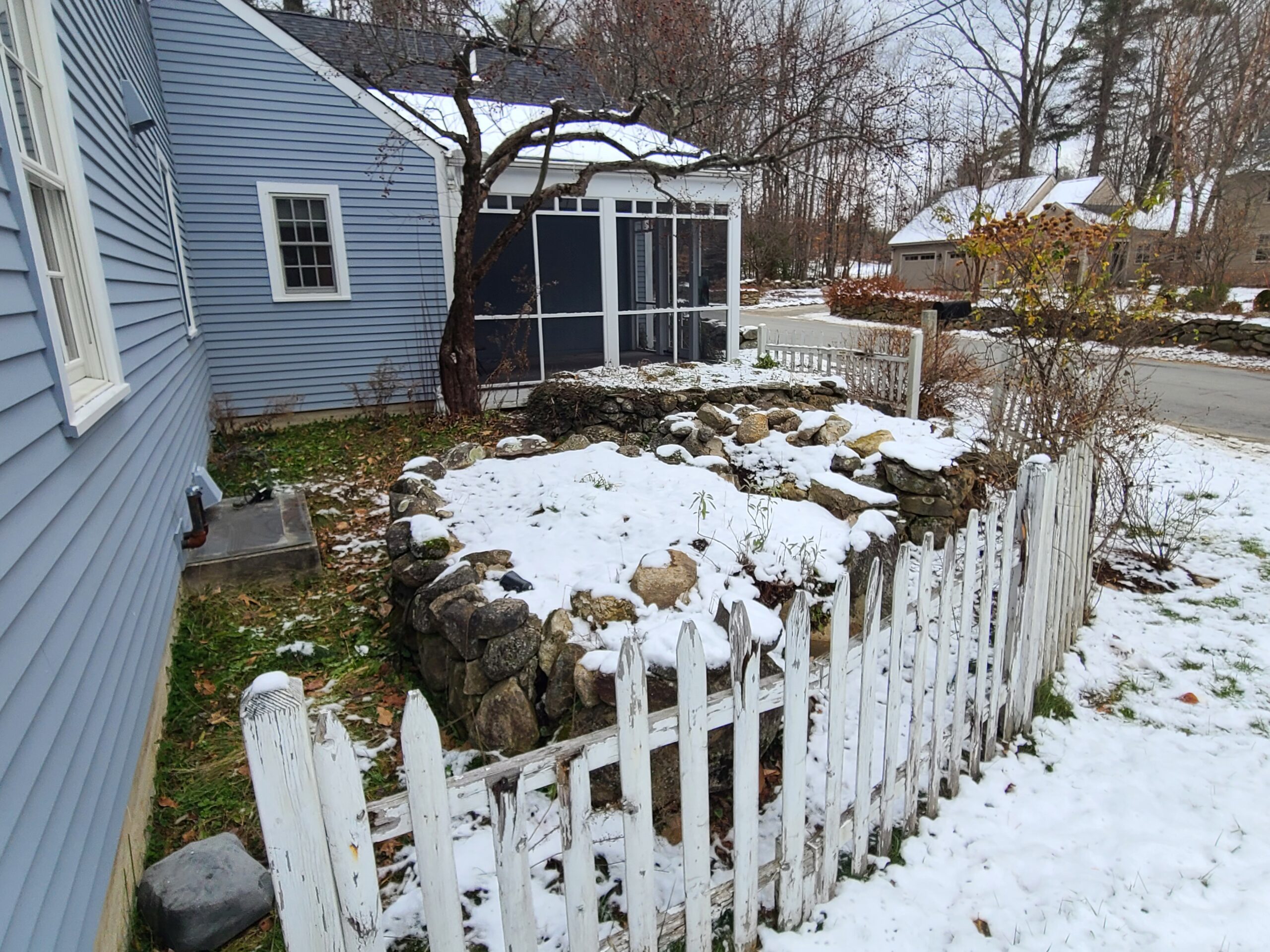 Stone Patio & Free Standing Wall Before